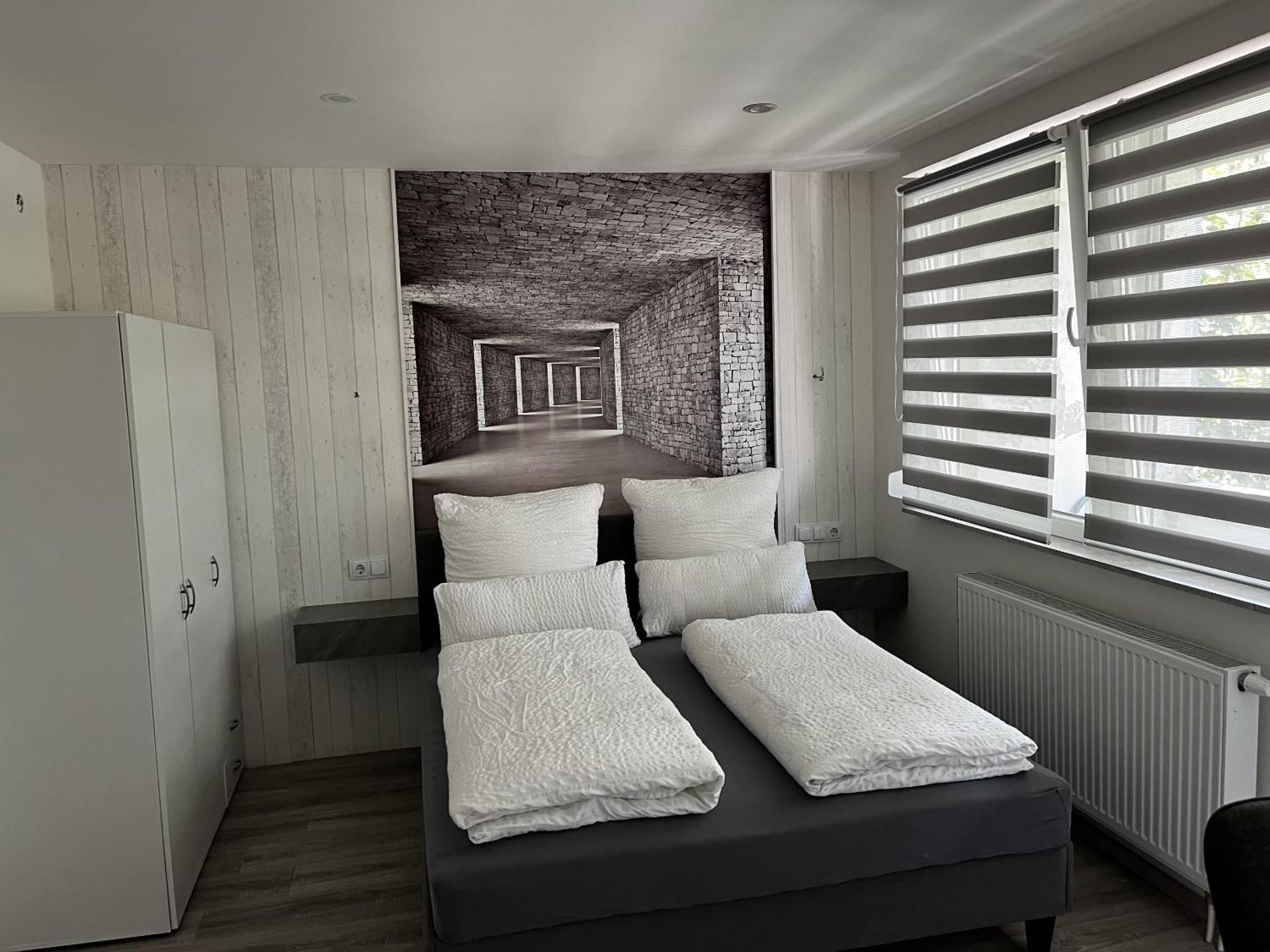 Messe-Hotelzimmer-Einzimmerappartement Leverkusen Rom bilde